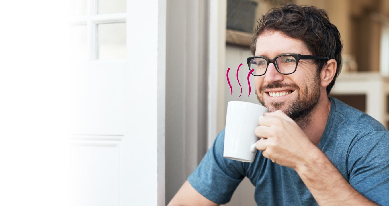 Man smiling with mug